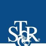 White TSKR logo letters with a small globe or circular emblem intertwined, set against a deep blue background