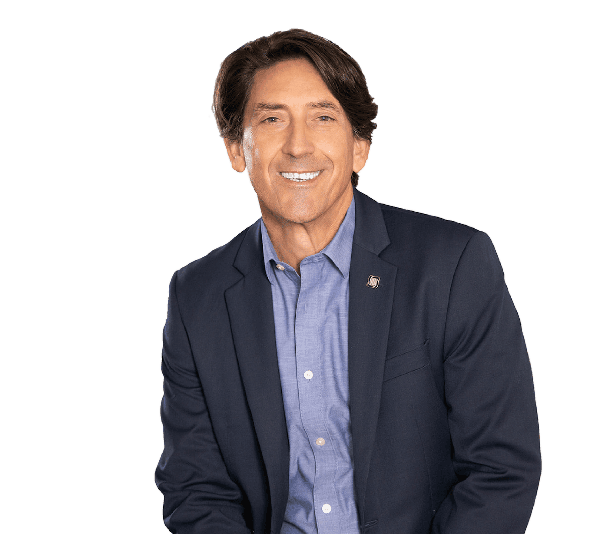 Middle-aged man with dark hair smiling, wearing a navy blue blazer and light blue button-down shirt