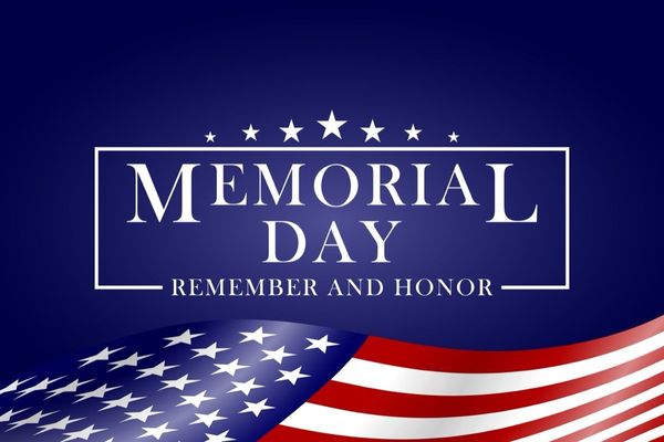 Memorial Day banner with white stars, blue background, and American flag colors honoring fallen military service members