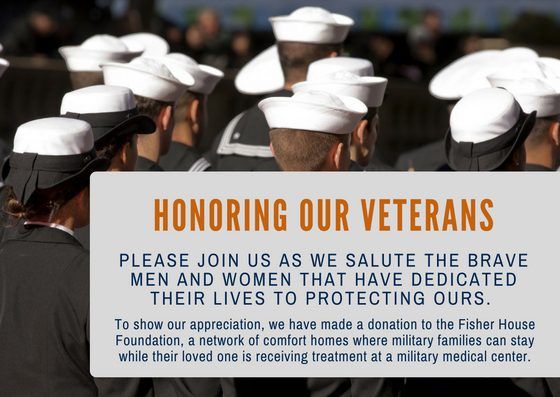 Military personnel in white caps stand in formation, honoring veterans with a Fisher House Foundation donation message