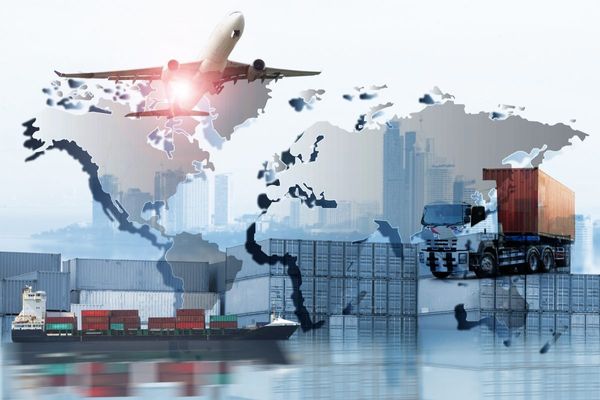 Airplane flying over world map with cargo ship, shipping containers, truck, and city skyline, symbolizing global