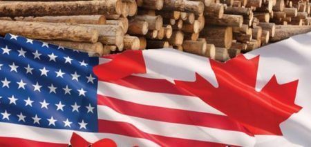 Stacked lumber logs behind overlapping United States and Canadian flags, symbolizing trade relations in the timber industry