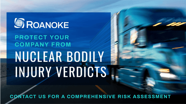 Blue semi-truck blurred in motion with Roanoke insurance ad warning about protecting companies from nuclear bodily