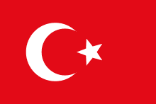 Vibrant red Turkish flag featuring a white crescent moon and white star, symbolizing Turkey's national identity